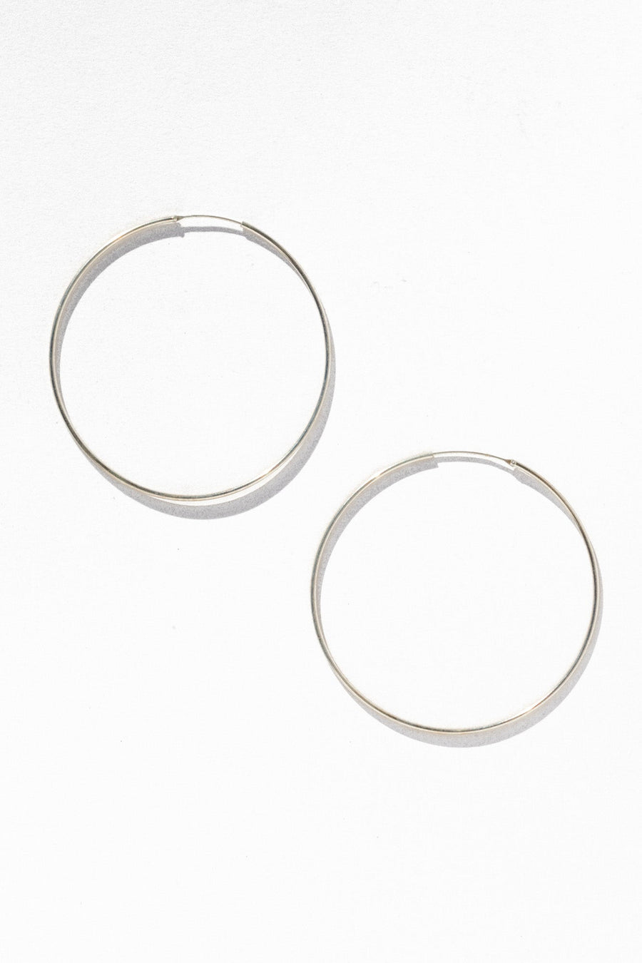 The Wellman Group Jewelry Silver Full Moon Statement Hoops